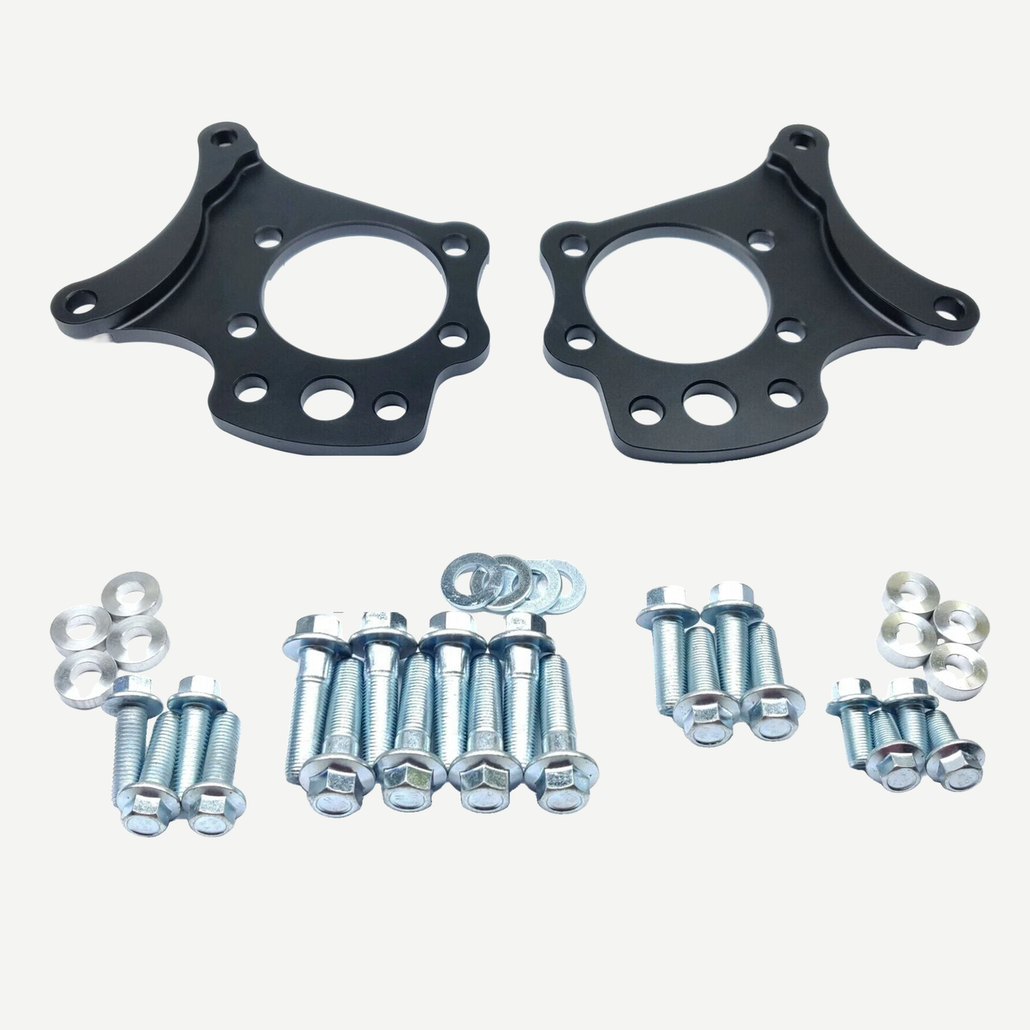 Dual caliper bracket kit for Nissan 350Z, Skyline V35 and Infiniti G35 — pair of black brackets with zinc-plated mounting hardware