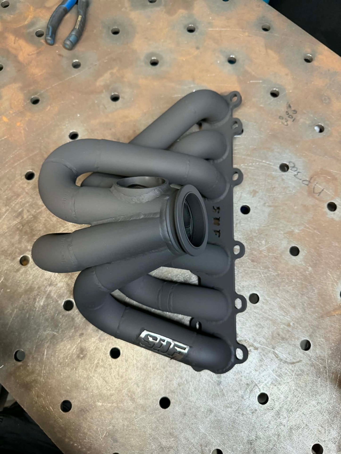Toyota 1JZ | High Mount Turbo Manifold | T3 T4 V-Band
